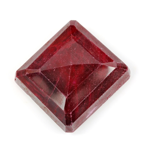 522 - An unmounted 542.9ct emerald-cut ruby, 45.85mm x 43.85mm x 20.20mm, 108.6g, with GLI report card