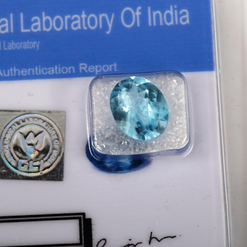 524 - An unmounted 4.8ct oval mixed-cut blue topaz, 12.00mm x 9.80mm x 6.00mm, with GLI report card