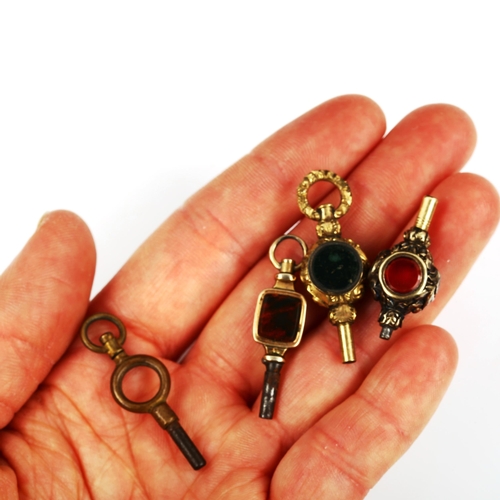 529 - 4 Antique pocket watch keys, including hardstone examples (4)