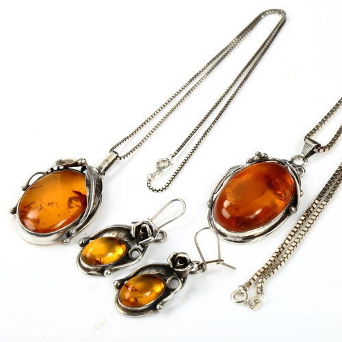 530 - A group of Danish silver and amber jewellery, comprising 2 x pendant necklaces, and 1 x pair earring... 