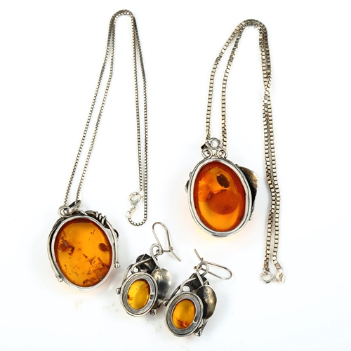 530 - A group of Danish silver and amber jewellery, comprising 2 x pendant necklaces, and 1 x pair earring... 