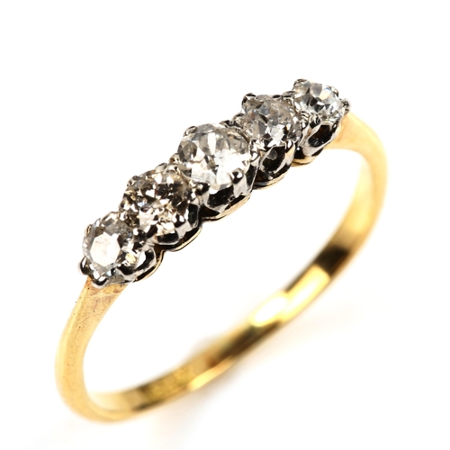 536 - An 18ct gold graduated five stone diamond ring, set with old-cut diamonds, total diamond content app... 