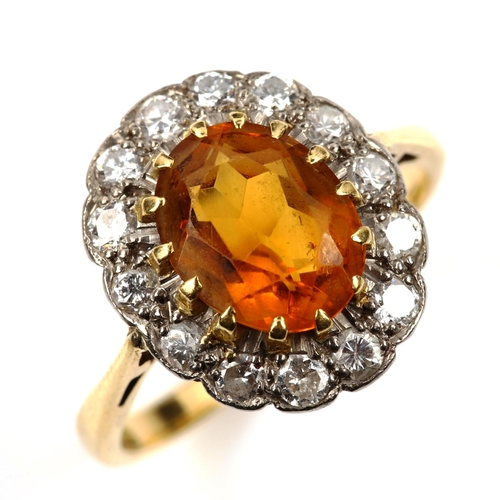 542 - An 18ct gold citrine and diamond oval cluster ring, set with oval mixed-cut citrine and modern round... 