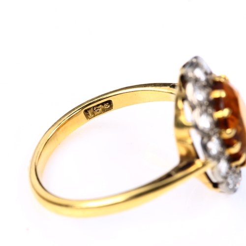 542 - An 18ct gold citrine and diamond oval cluster ring, set with oval mixed-cut citrine and modern round... 