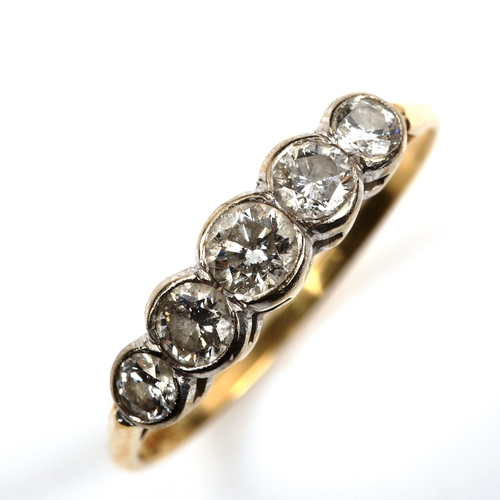 543 - An 18ct gold graduated five stone diamond ring, set with modern round brilliant-cut diamonds, total ... 