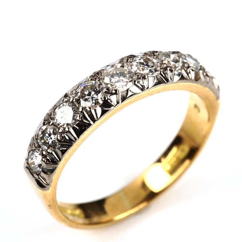 551 - An 18ct gold nine stone half eternity ring, set with modern round brilliant-cut diamonds, total diam... 