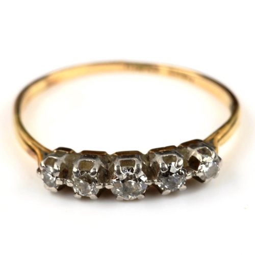 557 - An 18ct gold graduated five stone diamond ring, set with old European-cut diamonds, total diamond co... 