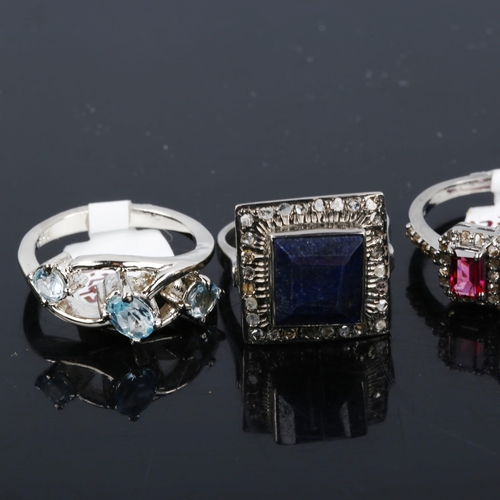 563 - 4 modern silver stone set rings, including sapphire diamond garnet and blue topaz, 19g total (4)