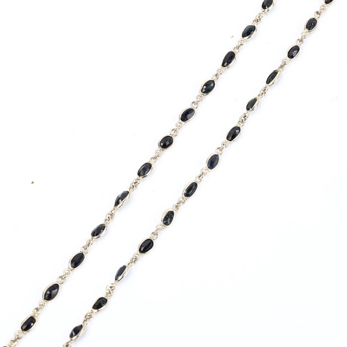 605 - A modern silver sapphire line necklace, set with oval mixed-cut sapphire, necklace length 50cm, 8.4g