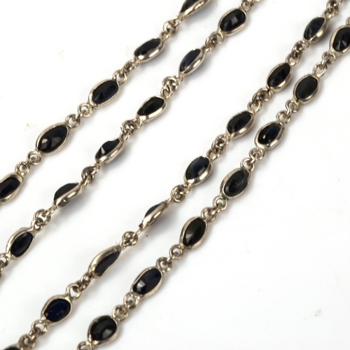 605 - A modern silver sapphire line necklace, set with oval mixed-cut sapphire, necklace length 50cm, 8.4g