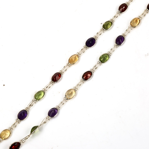 606 - A modern silver gem set line necklace, gemstones include peridot amethyst citrine and garnet, neckla... 