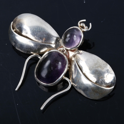 607 - A modern silver moonstone and amethyst figural bug brooch, wingspan 54mm, 9.5g