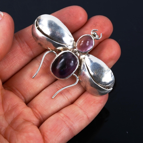 607 - A modern silver moonstone and amethyst figural bug brooch, wingspan 54mm, 9.5g