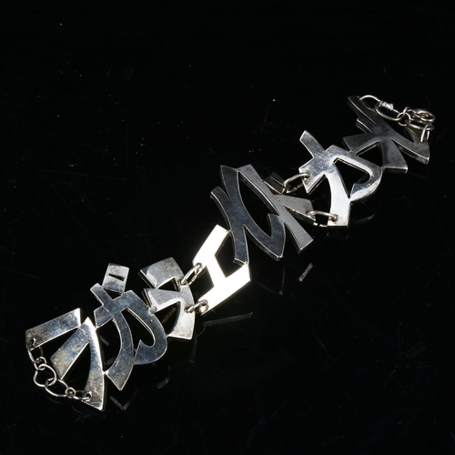 734 - LAGERFELD GALLERY - a Vintage silver plated bracelet, length 19cm