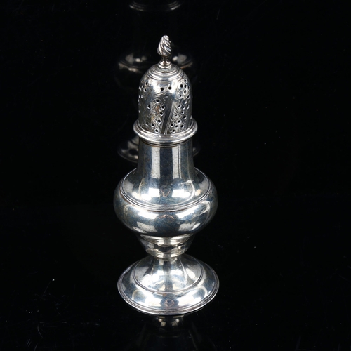 735 - A George III silver baluster pepperette, with engraved foliate decoration and spiral finial, hallmar... 