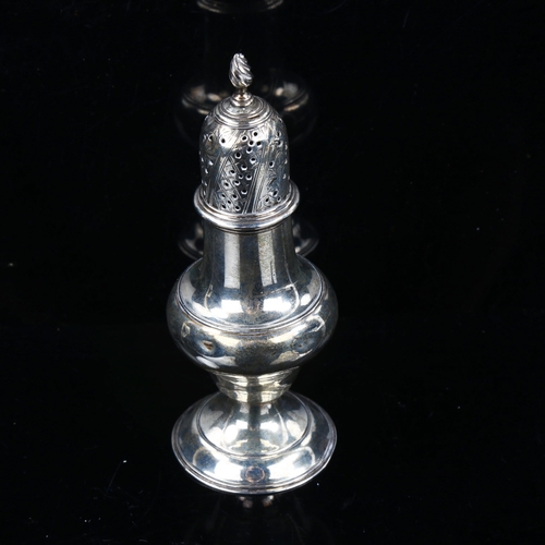 735 - A George III silver baluster pepperette, with engraved foliate decoration and spiral finial, hallmar... 