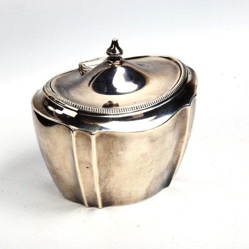 739 - A small George V silver tea caddy, oval form, indistinct maker's marks, hallmarks Birmingham 1921, h... 