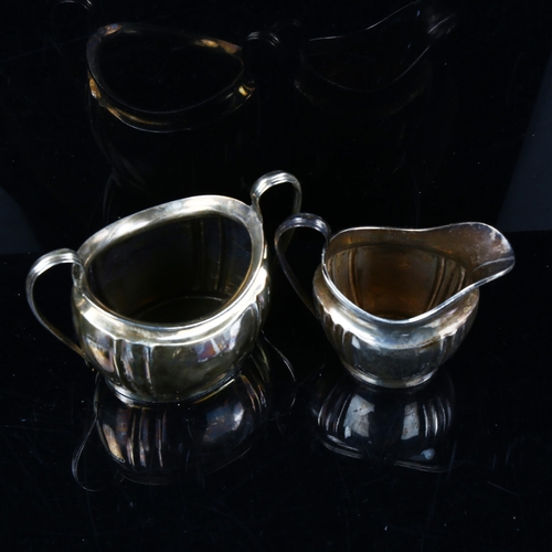 740 - A George V silver matching cream jug and sugar bowl, by S Blanckensee & Sons Ltd, hallmarks Birmingh... 