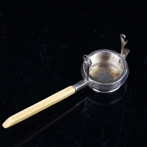 741 - A George V silver ivory-handled tea strainer stand, by Goldsmiths & Silversmiths Co Ltd, hallmarks L... 