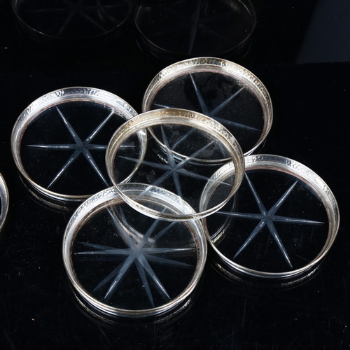 744 - A set of 6 American sterling silver-mounted glass drink's coasters, in stacking stand, diameter 8cm,... 