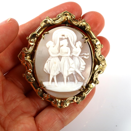 323 - A 19th century relief carved shell cameo brooch, depicting The Three Graces, in gold plated frame, b... 