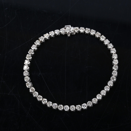 327 - A modern 18ct white gold diamond tennis line bracelet, set with modern round brilliant-cut diamonds,... 