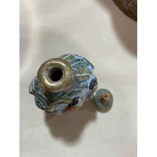 1017 - 3 Chinese snuff bottles, comprising a relief carved jade bottle with stopper, height 4.5cm, a relief... 