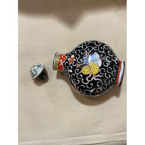 1017 - 3 Chinese snuff bottles, comprising a relief carved jade bottle with stopper, height 4.5cm, a relief... 