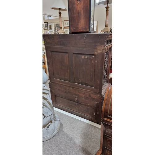 1378 - An impressive 19th century Neo-Classical design walnut 2-door cupboard, the 2 finely carved and pane... 