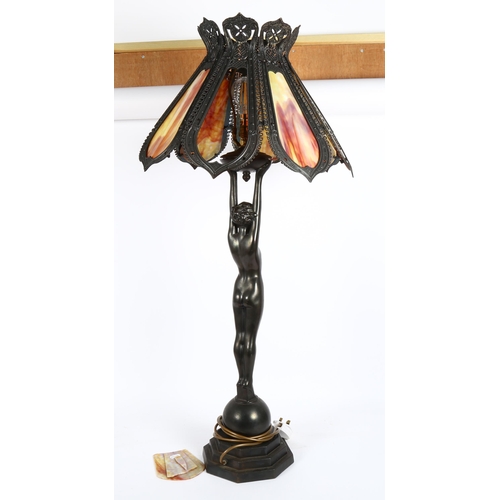 14 - A large reproduction spelter figural table lamp, with mottled glass shades, height 98cm (1 panel bro... 