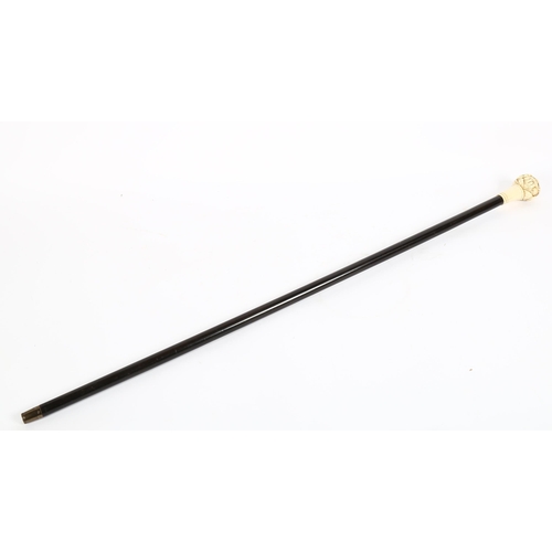 23 - A Japanese resin-topped ebonised walking cane, length 93cm