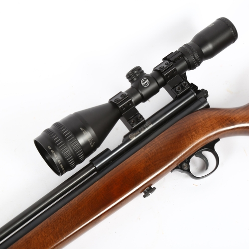 34 - A Cosmk .22 calibre air rifle, with Hawke 3-9x50 scope, serial no. XS78CO2, in softshell gun slip