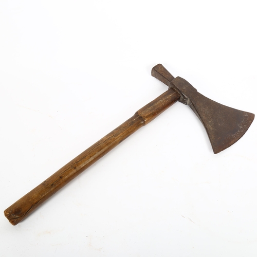 48 - An 18th century Colonial American hatchet, the triangular flaring blade with hammerhead terminal, le... 