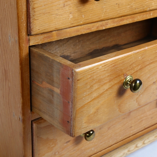 57 - A pine table-top chest of drawers, W47cm, H50cm, D22cm