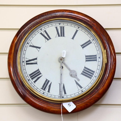 65 - An early 20th century mahogany-framed 30-hour circular dial wall clock, overall diameter 40cm, with ... 