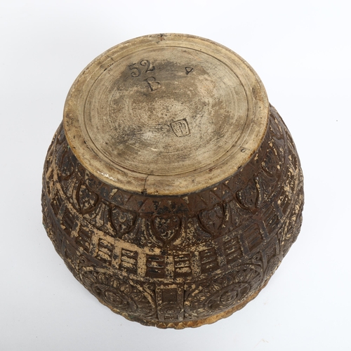 7 - A pottery Aztec design jardiniere, stamped maker's mark on base with impressed no. 52B, diameter 26c... 