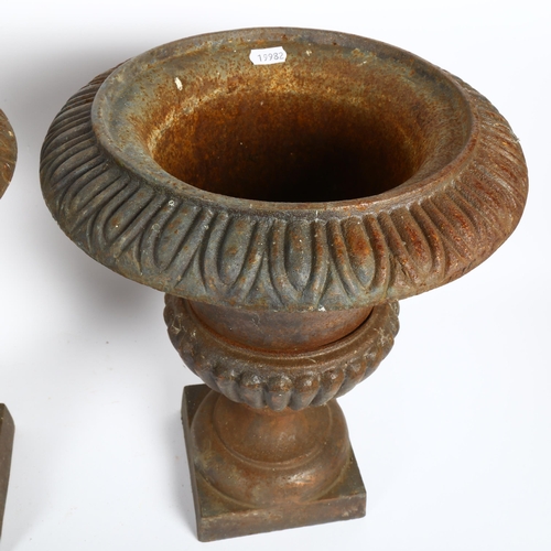 8 - A pair of weathered cast-iron Campana urns, height 37cm