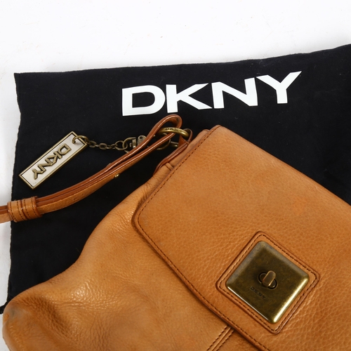 83 - DKNY - a tan leather shoulder bag