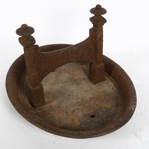 94 - A cast-iron boot scraper, length 35cm, height 22cm