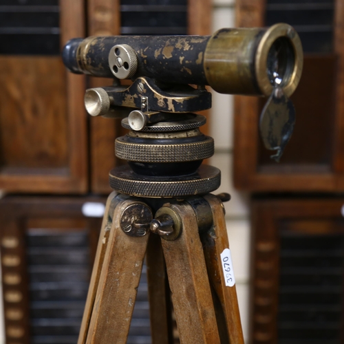 133 - An early 20th century surveyor's level, by E R Watts & Son London, serial no. 14775, on tripod stand... 