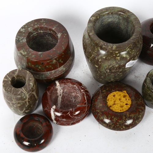 199 - A group of serpentine marble Vesta and vases