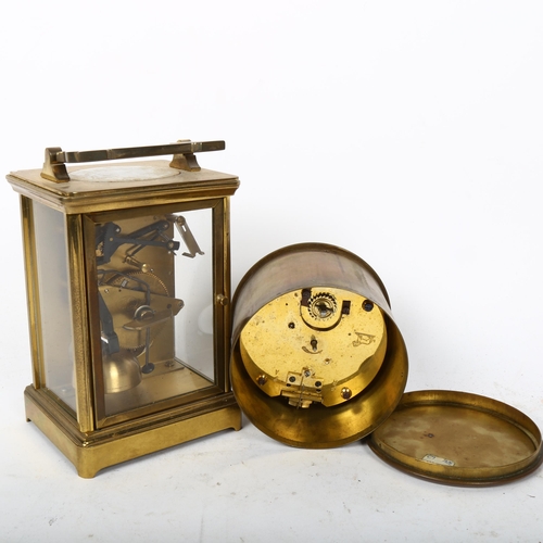 244 - A reproduction brass-cased carriage clock, by Estyma, and a brass-cased drum clock, diameter 10cm (2... 