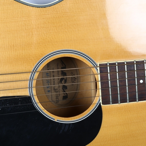 304 - An Aria acoustic guitar, in softshell case