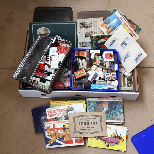 322 - A large quantity of Vintage cigarette cards, albums and matchbooks (boxful)