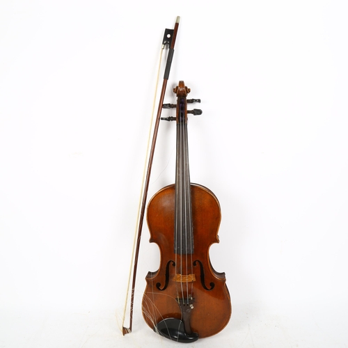 347 - A Vintage violin, globe sticker inside, body length 36cm, with bow, in hardshell case