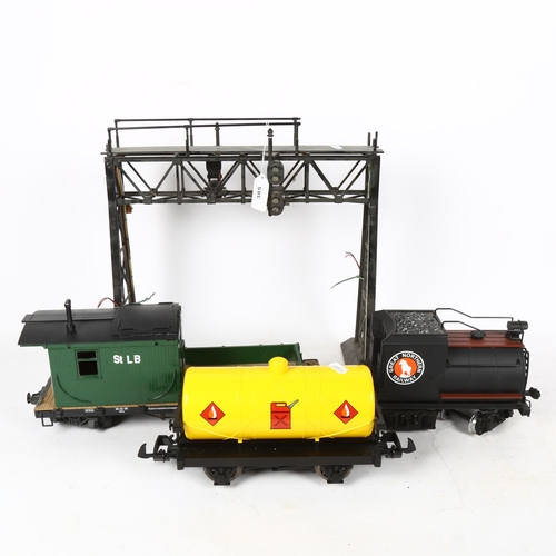 385 - 3 G-gauge rolling stock locomotive carriages and tankers, and a gantry, height 37cm (4)