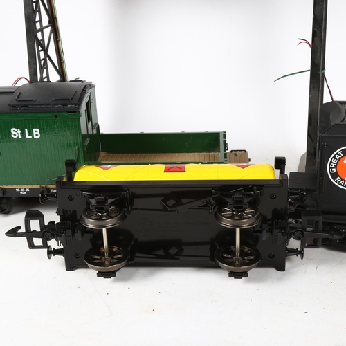 385 - 3 G-gauge rolling stock locomotive carriages and tankers, and a gantry, height 37cm (4)