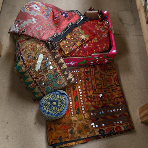 482 - Eastern embroidered throws, a scarf, cushion etc