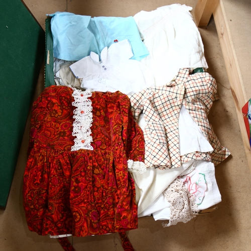 605 - Vintage children's clothing, and a box of table linen