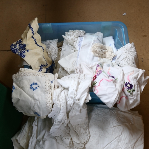 606 - An embroidered white bed cover, table cloths and other linen